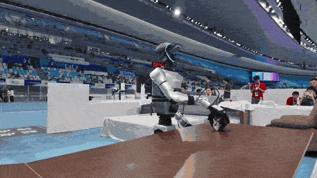 BEIJING CHINA AUGUST 16 A humanoid robot takes part in the Hotel scenario cleaning service event on day two of the 2025...